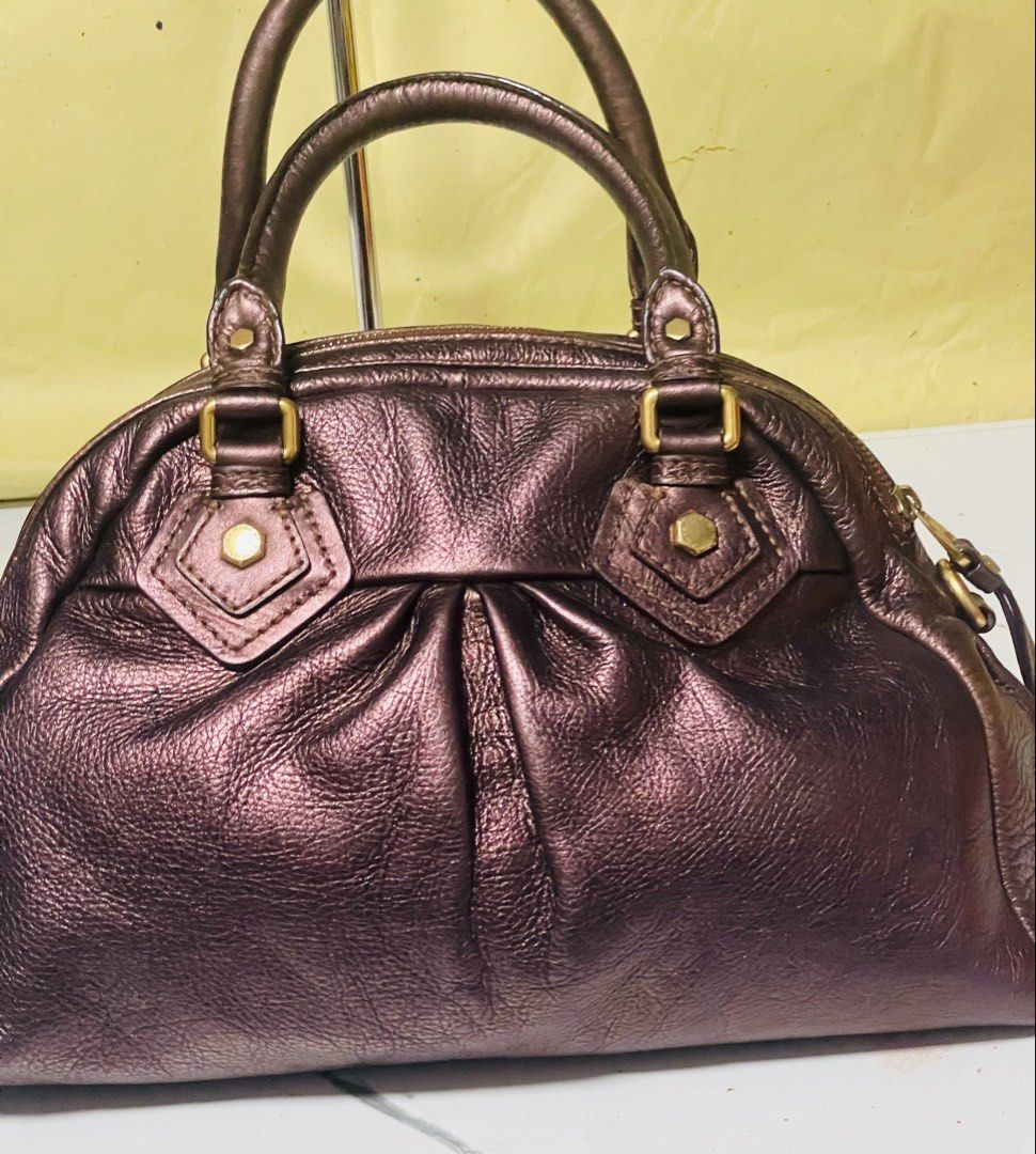 Marc by Marc Jacobs Metallic Leather Satchel Bag (Category: Luxury Bags & Wallets) located in Manila. Submitted by ermenchita71969 (Listing ID 1452466042, Image 2). Description: - Metallic bronze leather satchel bag - Top handles and detachable shoulder strap - Interior zip pocket and slip pocket - Zipper closure - Made in Indonesia - Ideal everyday bag.
