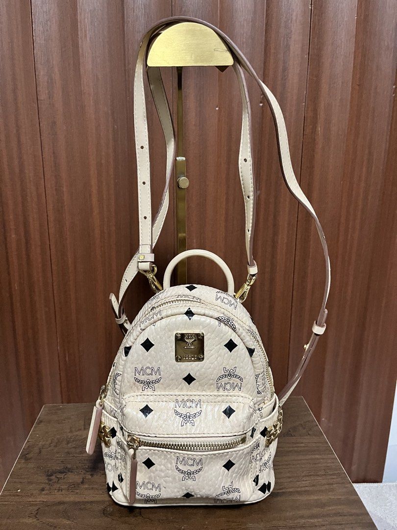 MCM Visetos Mini Backpack Beige (Category: Luxury Bags & Wallets) located in Cebu City. Submitted by nbetcuban007trendyfinds (Listing ID 1452350547, Image 1). Description: - Authentic MCM Mini Backpack - Classic Beige Visetos Print - Gold Hardware Details - Adjustable Straps - Compact Size - Ideal for Essentials - Zippers Function Smoothly - Turnable screw, like new -Last 2 pics sample only on how to wear.