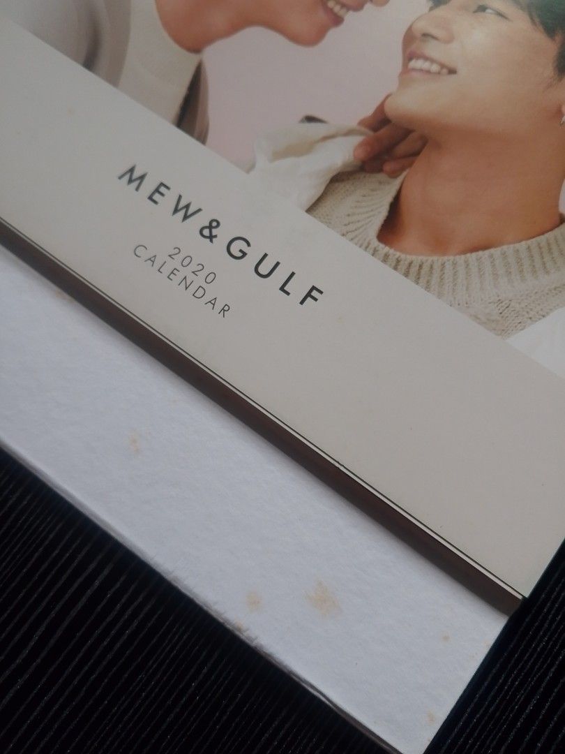 Mew & Gulf 2020 Desk Calendar (Category: Stationery & School Supplies) located in Quezon City. Submitted by osaki.drew (Listing ID 1452429403, Image 2). Description: - Mew & Gulf 2020 Desk Calendar - Spiral binding for easy page turning - Front cover features a lovely photo of Mew and Gulf - Back cover is plain white (With yellow stains due to long storage) - Minor marks on the white base, as pictured - Ideal for fans of Mew and Gulf.