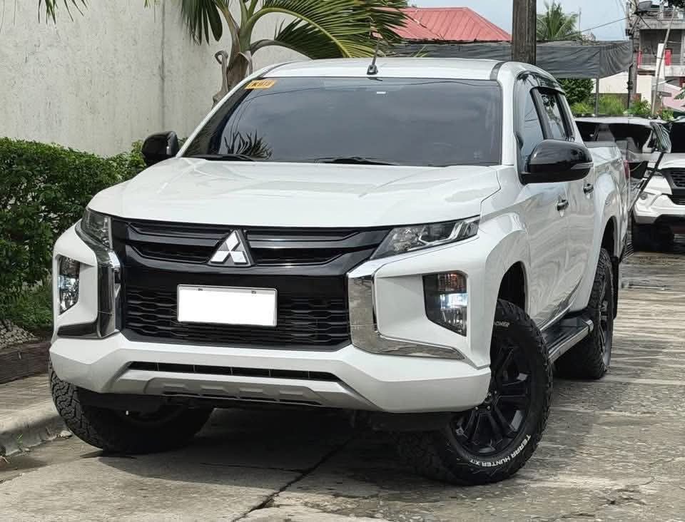 Mitsubishi Strada GLS 4x2 Black Edition Auto (Category: Used Cars) located in Manila. Submitted by quality_cars (Listing ID 1452500635, Image 2). Description: Another Fresh Pick up mga Boss Cash / Financing / Trade-in Mitsubishi Strada Gls 4x2 Black Edition 2023 model Matic trans ( paddle shift ) Diesel engine All power features Push start / keyless entry Touchscreen headunit 49,000 mileage only Fresh in and out Price: 883,000 only Location: Norz
