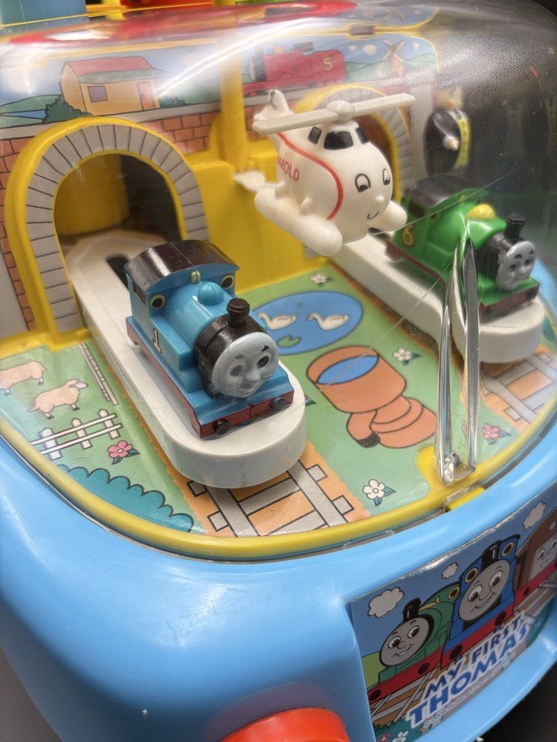 Thomas and Friends Ride On Toy (Category: Kids Toys) located in Lipa City. Submitted by biboystoyhouse (Listing ID 1452331031, Image 2). Description: This is a “My First Thomas” GOGO Tunnel Thomas ride-on toy, featuring a clear plastic dome with interactive train and helicopter toys inside.It is designed for toddlers aged 10 months to 4 years, with a maximum weight capacity of 20 kg..