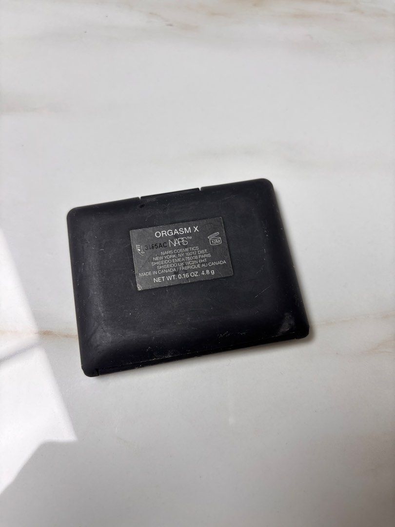 NARS Orgasm X Blush (Category: Makeup) located in Leyte. Submitted by modernpersephone (Listing ID 1452424796, Image 3). Description: - NARS Blush in shade Orgasm X - Beautiful peachy pink with subtle shimmer - Compact includes a mirror - Perfect for adding a pop of color to cheeks - Selling because of having too many blushes - Still has plenty of product remaining Used a few times lang. This is full size. .