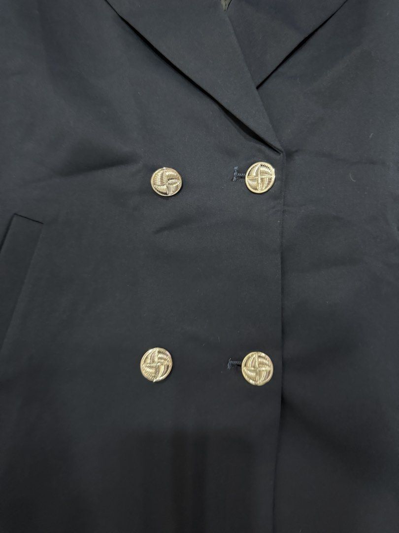 Navy Blue Sleeveless Blazer and Shorts Set (Category: Sets or Coordinates) located in Pasig City. Submitted by atbp__ (Listing ID 1452455893, Image 3). Description: - Navy blue sleeveless blazer and matching shorts set - Blazer: Double-breasted with silver-toned buttons - Shorts: Single button closure at waist - Both pieces are unhemmed - Ideal for a smart casual outfit.