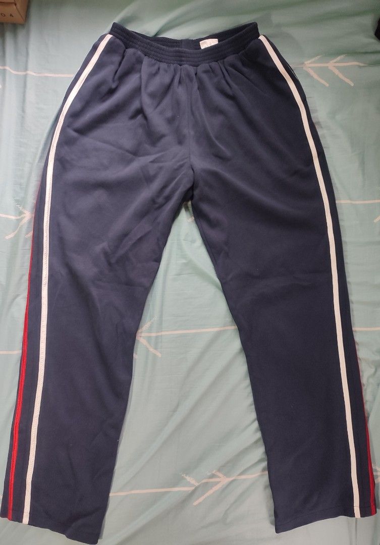 Navy Blue Track Pants (Category: Other Bottoms) located in General Trias. Submitted by dunht (Listing ID 1452408103, Image 1). Description: Navy Blue Track Pants with Red and White Stripes W- 30 can be stretched to 40 L- 42 Color Rate: 9/10.