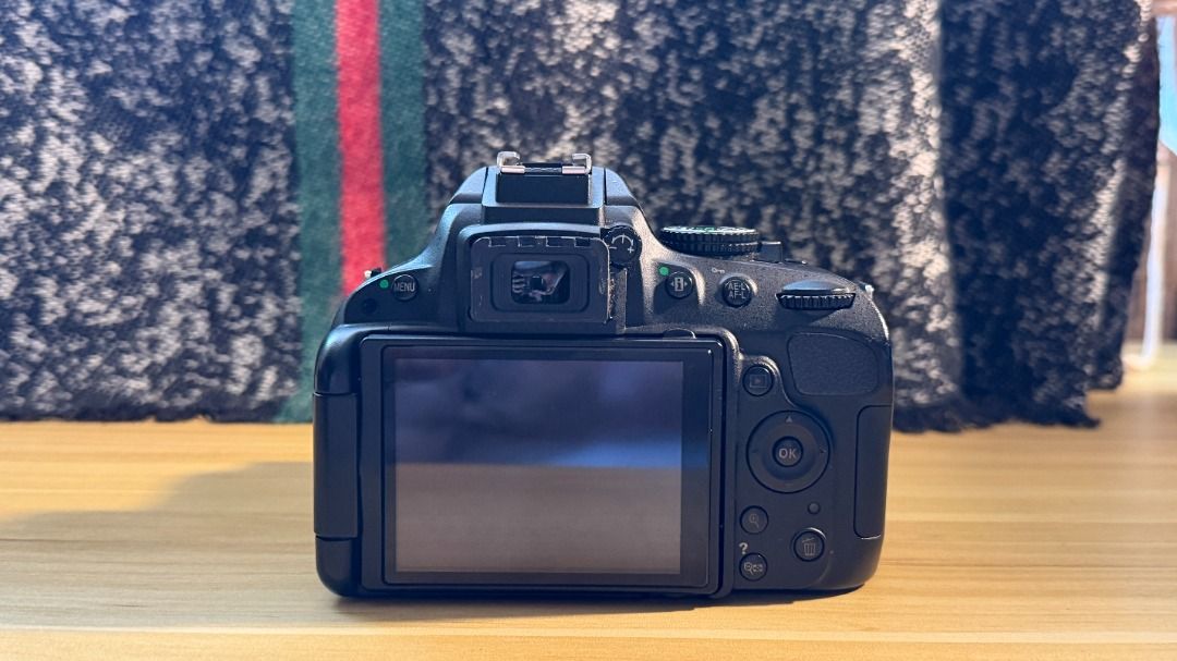 Nikon D5100 (With screen vignette) (Category: Cameras) located in Manila. Submitted by zaireously (Listing ID 1452357705, Image 2). Description: For Sale: Nikon D5100 Bought: 2018 RFS: No longer needed / Extra Funds Comes with a new Yongnuo 35mm Lens bought just a week ago, along with the original Nikon Strap, Nikon EL14 Battery, Battery Charger, and camera bag with rain protection. Honest Issue: The camera has screen vignette. This does not affe