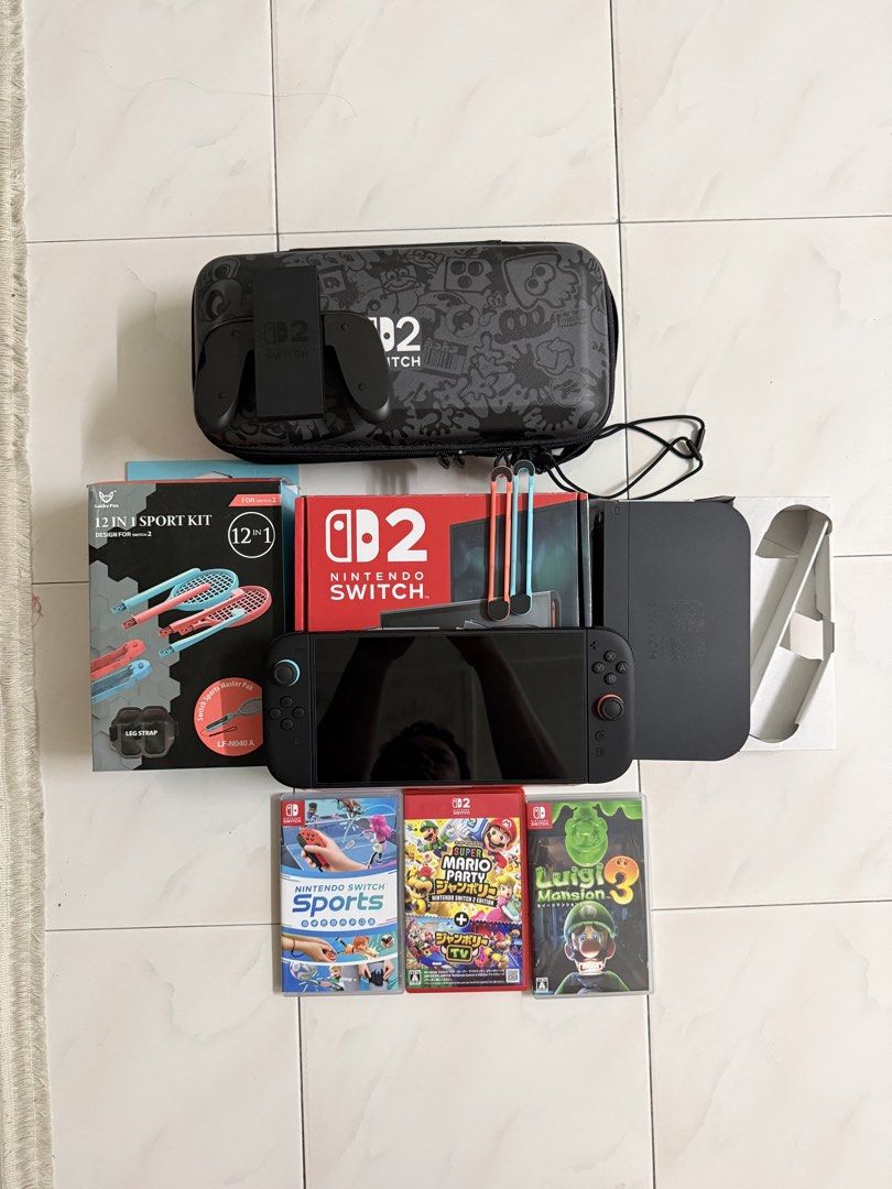 Nintendo Switch Console with Games and Accessories (Category: Nintendo) located in Johor Bahru. Submitted by fa_azim (Listing ID 1452464560, Image 1). Description: - Nintendo Switch Console - Games included: Nintendo Switch Sports, Super Mario Party, Luigi's Mansion 3 - Accessories: 12-in-1 sport kit, Splatoon-themed carrying case - Condition: Good, ready for fun!.