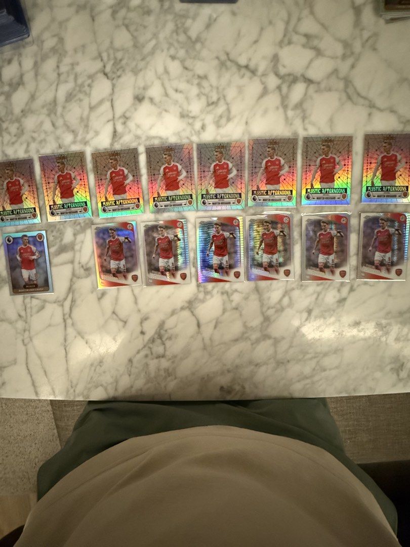 Odegaard card (Category: Raw Cards) located in Singapore. Submitted by wiseturtle_b4ebeb (Listing ID 1452353836, Image 1). Description: - Collection of Martin Odegaard football cards - Includes 8x Mystic Afternoon' set - 6x chrome refractors + 1x Merlin refractor - bulk sale only - Ideal for Arsenal fans and collectors - Feel free to ask any questions.