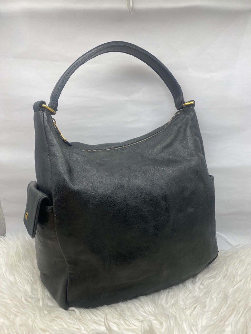 original ysl black hobo bag (Category: Luxury Bags & Wallets) located in Quezon City. Submitted by jhen141414 (Listing ID 1452495352, Image 2). Description: original money back guaranteed! can pick up at our timog branch .