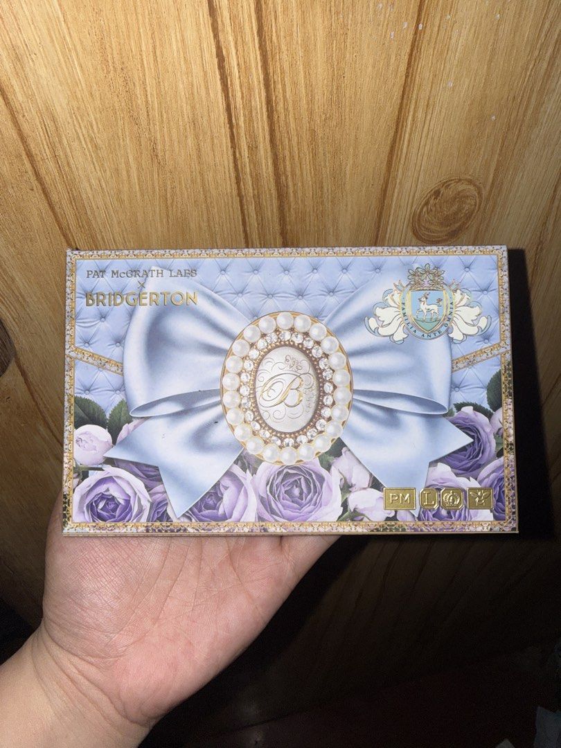Pat McGrath Labs Bridgerton Eyeshadow Palette (Category: Makeup) located in Manila. Submitted by avi.ww (Listing ID 1452468119, Image 1). Description: - Pat McGrath Labs Bridgerton Eyeshadow Palette - Features 6 beautiful shades - Some shades have intricate bee imprints - Perfect for creating versatile looks - Comes in its original packaging - Bought from USA.