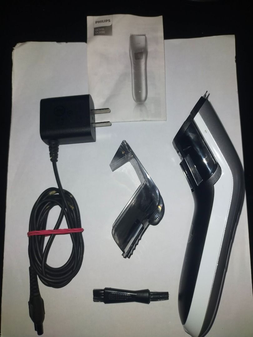 Philips QC5131 Rechargeable Hair Clipper/Trimmer (Category: Hair) located in Manila. Submitted by warmshark.1ae1ea (Listing ID 1452458421, Image 2). Description: Philips QC5131 Rechargeable Hair Clipper + Complete Accessories ₱2500 (negotiable) Used only once. Cleaned and sanitized before listing. Blade has been brushed clean and there are no hair residues. Works perfectly. Includes: ✔ Philips QC5131 Hair Clipper (China version) ✔ Original Charge