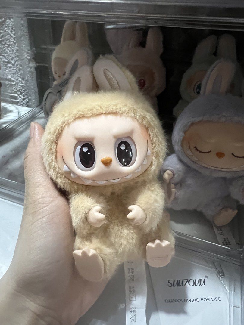 Pop Mart Labubu Have a Seat Collection (Category: Plushies & Soft Toys) located in Taguig. Submitted by strutstella (Listing ID 1452494397, Image 2). Description: - Adorable Pop Mart bunny plush toys - Made with soft and fluffy material - Available colors: beige, grey, light purple, mint green - Each bunny features a unique expression and bunny hood - Ideal for collectors or as a thoughtful gift Selling this as a set only All are in like new cond
