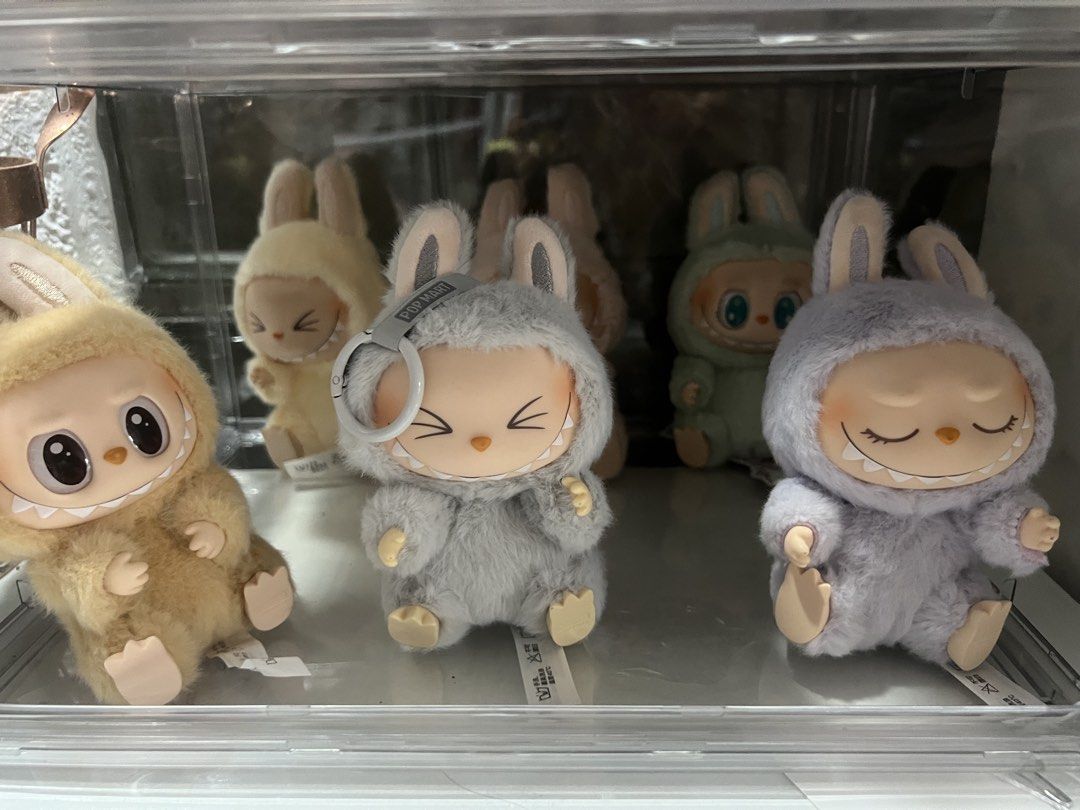 Pop Mart Labubu Have a Seat Collection (Category: Plushies & Soft Toys) located in Taguig. Submitted by strutstella (Listing ID 1452494397, Image 1). Description: - Adorable Pop Mart bunny plush toys - Made with soft and fluffy material - Available colors: beige, grey, light purple, mint green - Each bunny features a unique expression and bunny hood - Ideal for collectors or as a thoughtful gift Selling this as a set only All are in like new cond