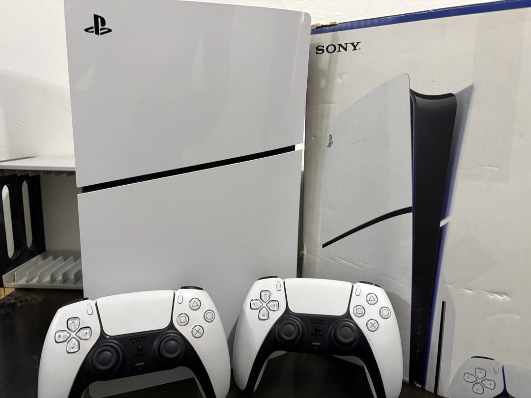 PS5 slim for sale with 2 controllers and 3 games! (Category: PlayStation) located in Caloocan City. Submitted by justinebue57739 (Listing ID 1452321389, Image 2). Description: PS5 slim Complete with 2 Controllers, Original box and 3 Games! For only 29.5K! PWEDE SWAP SA PS4 para sa gusto mag upgrade! Your PS4 + Cash! 🎮🤑 complete cables and no issue. Unli test po UPON PICKING UP FOR SALE OR SWAP pm your offers! FIRMWARE: LATEST STORAGE: 1TB SSD I