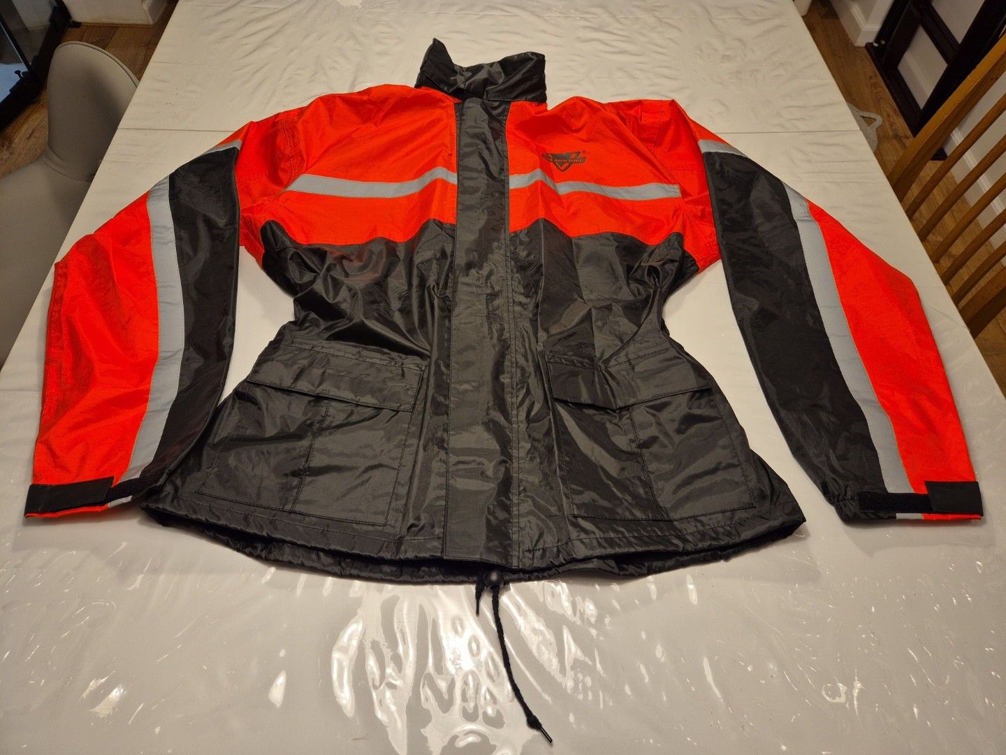 Rain Jacket (Category: Motorcycle Apparel) located in Singapore. Submitted by xavez (Listing ID 1452462055, Image 1). Description: Thick type rain jacket. No leaks. Size XL (stated M size, American sizing) Selling the jacket only. Postage available Nelson Rigg Stormrider.