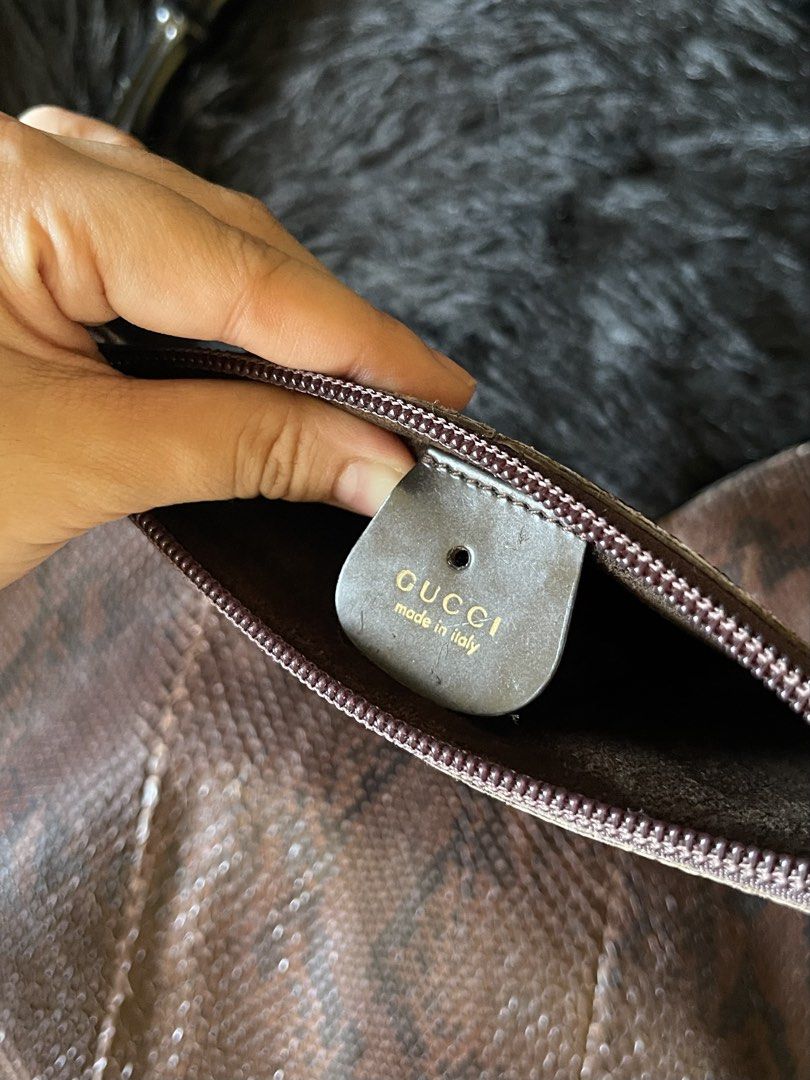 RARE Gucci Snakeskin Bamboo Shoulder bag (Category: Luxury Bags & Wallets) located in Davao. Submitted by boodle4lyf (Listing ID 1452477045, Image 3). Description: Authentic vintage GG bag. In very good condition with minimal signs of use only. Leather tag is inside the pouch. Suede interior no sticky feeling. Gold hardwares..