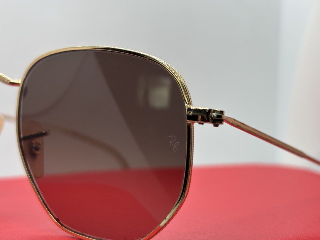 Ray-Ban RB3548N Hexagonal Flat Sunglasses Gold Frame (Category: Sunglasses & Eyewear) located in Bacoor. Submitted by cryptl (Listing ID 1452324277, Image 3). Description: - Authentic Ray-Ban RB3548N Hexagonal Flat sunglasses - Distinctive gold metal frame - Flat lenses for a modern look - Ideal for everyday wear - Please check photos for detailed condition.