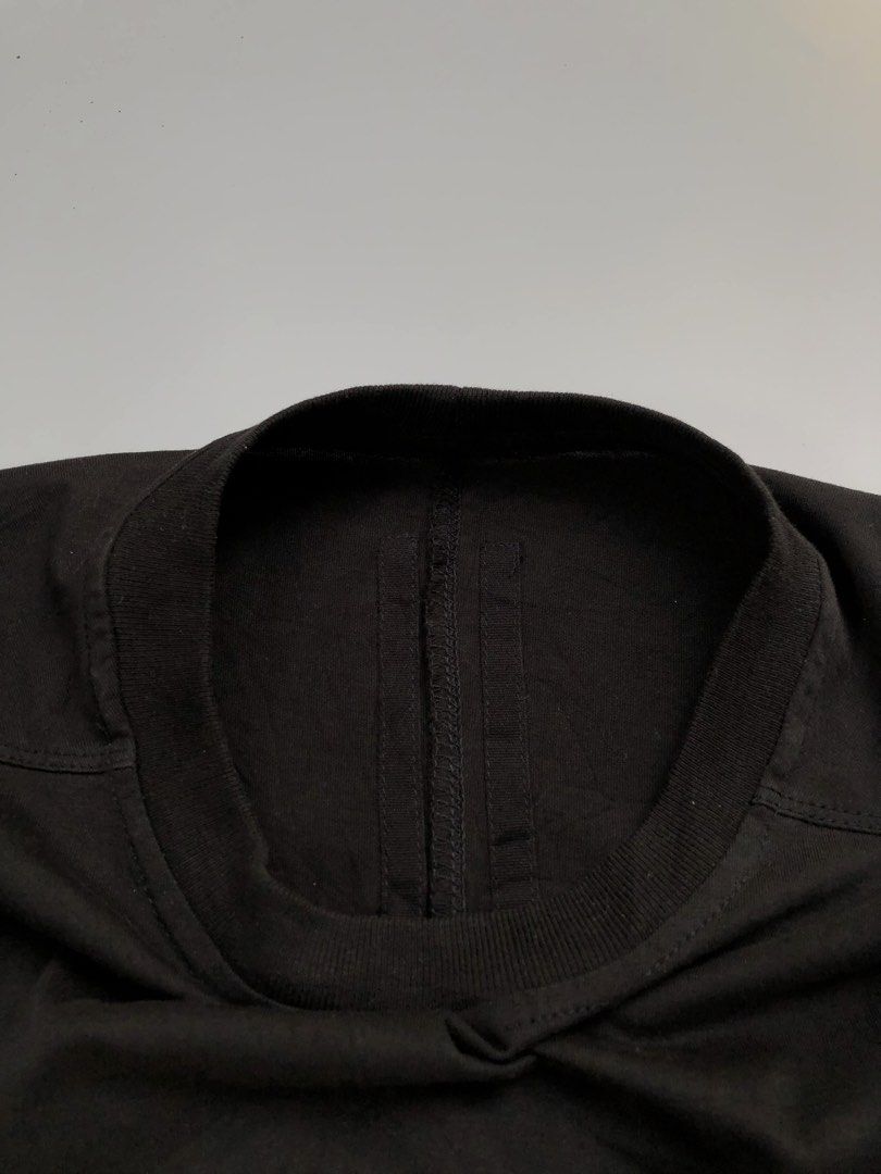 Rick Owens Graphic Print T-Shirt (Category: Luxury Apparel) located in Manila. Submitted by thriftedluxgarments (Listing ID 1452483554, Image 2). Description: - Black graphic t-shirt - Features a black and white photo print on the front - Made from 100% cotton - Tag size: XL - Perfect addition to any collection.