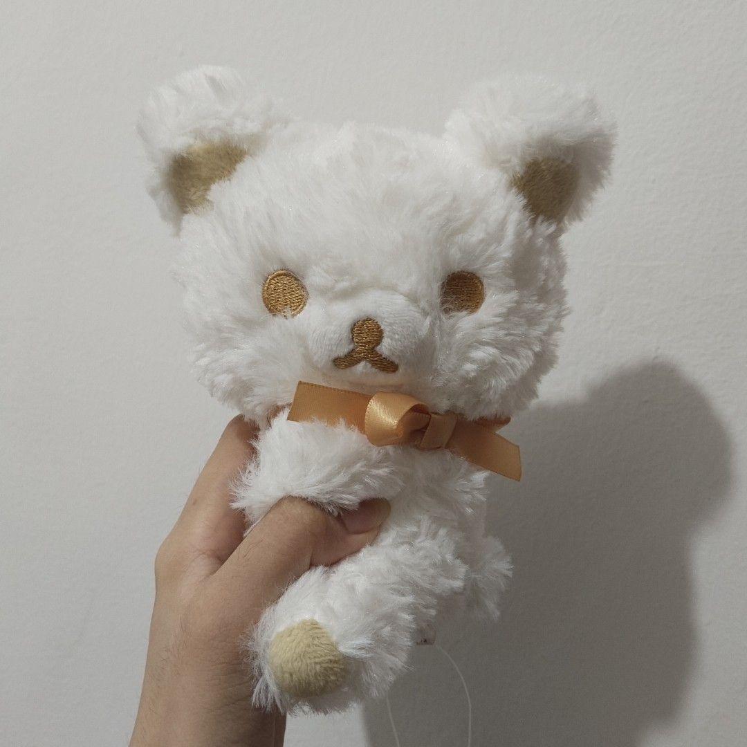 rilakkuma white gold plush (Category: Plushies & Soft Toys) located in General Trias. Submitted by chcopdding (Listing ID 1452450014, Image 1). Description: authentic! with tag:)) size: 15 cm loc: gen trias, cavite mop: gcash/maribank mod: lalamove/jnt.