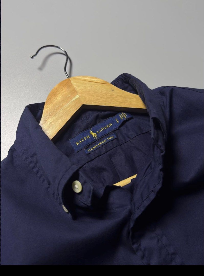Rl navy button down red pony (Category: Luxury Apparel) located in Bacoor. Submitted by bootsknocker (Listing ID 1452478342, Image 3). Description: RALPH LAUREN Button down L/S -perfect for casual fits Fits S-M 17” width 27 “length Pristine condition 10/10 color rate AUTHENTIC✅.