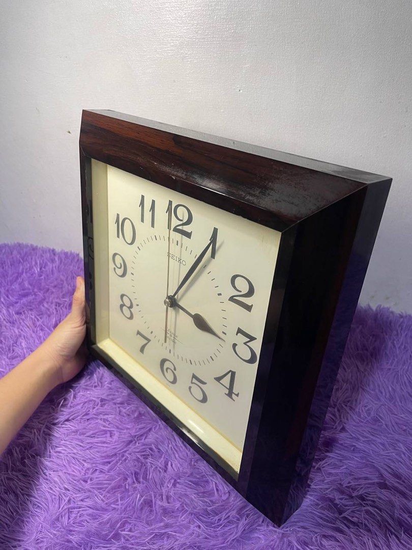Seiko Chime Strike Wooden Wall Clock (Category: Clocks) located in Manila. Submitted by nicanicss (Listing ID 1452421500, Image 3). Description: Seiko Chime Strike Wooden Wall Clock - Original Seiko wall clock - Chime Strike model (chime not working) - Clock mechanism works properly - Elegant dark wood frame - Quartz movement - Large, easy-to-read numbers - Good condition with minor signs of use - Ideal for home, office, or collection Length: 13 