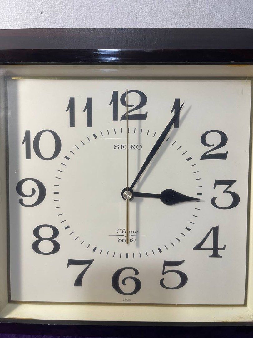 Seiko Chime Strike Wooden Wall Clock (Category: Clocks) located in Manila. Submitted by nicanicss (Listing ID 1452421500, Image 2). Description: Seiko Chime Strike Wooden Wall Clock - Original Seiko wall clock - Chime Strike model (chime not working) - Clock mechanism works properly - Elegant dark wood frame - Quartz movement - Large, easy-to-read numbers - Good condition with minor signs of use - Ideal for home, office, or collection Length: 13 