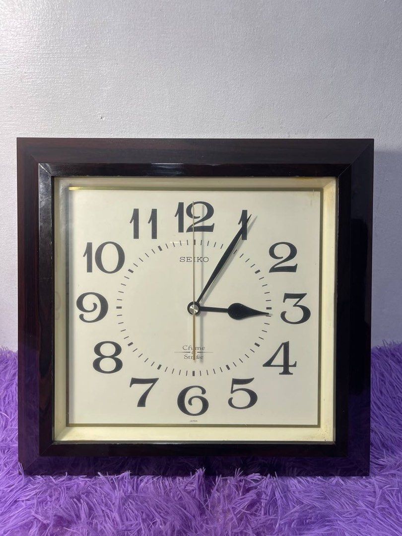 Seiko Chime Strike Wooden Wall Clock (Category: Clocks) located in Manila. Submitted by nicanicss (Listing ID 1452421500, Image 1). Description: Seiko Chime Strike Wooden Wall Clock - Original Seiko wall clock - Chime Strike model (chime not working) - Clock mechanism works properly - Elegant dark wood frame - Quartz movement - Large, easy-to-read numbers - Good condition with minor signs of use - Ideal for home, office, or collection Length: 13 