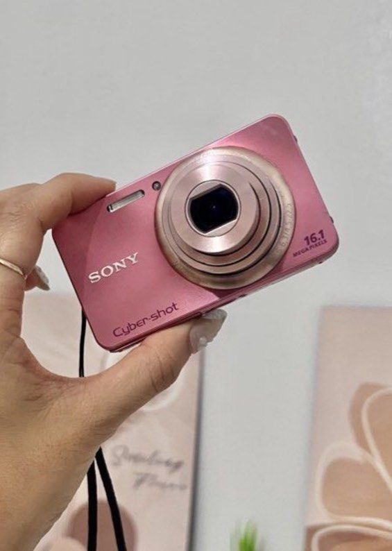 Sony Cybershot W570 (Pink) (Category: Cameras) located in Paranaque City. Submitted by kaleeen21 (Listing ID 1452328235, Image 1). Description: 📸 Sony Cybershot W570 (Pink) Compact, stylish, and perfect for everyday shots! ✨ Inclusions: • Hard case • Charger • 2 batteries • Wrist strap 💡 Condition: • With visible scratches (cosmetic only) • Fully working, no issues • Please manage expectations rfs: preloved 📍 Delivery | Meet-up: Parañaque City