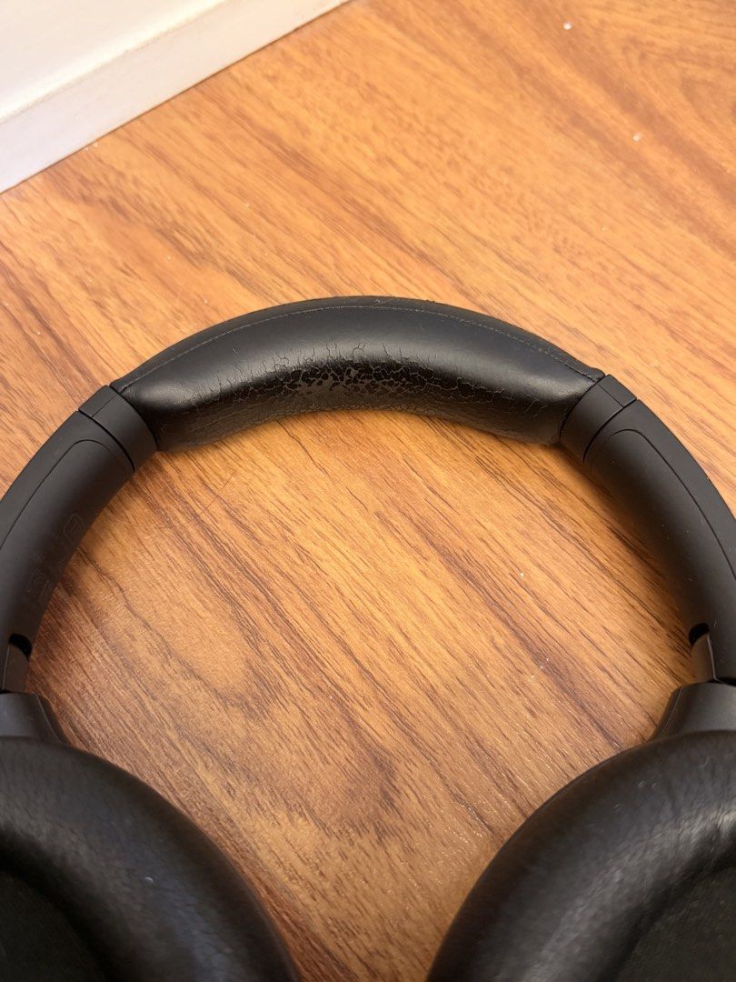 Sony WH-1000XM4 Headphones (Category: Headphones & Headsets) located in Cebu City. Submitted by ninacinimide (Listing ID 1452379329, Image 3). Description: fair condition includes a charging cable, audio cable, and a small Bluetooth adapter model number is visible on the headband negotiable! .