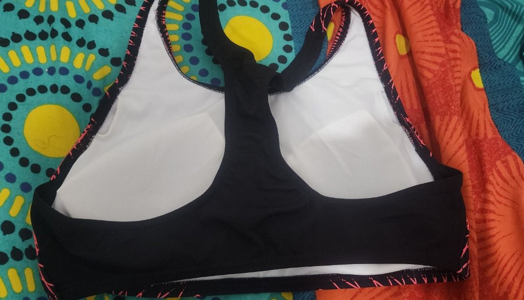 Speedo Endurance+ Black Pink Swimsuit Set (Category: Bikinis & Swimsuits) located in Manila. Submitted by 09mk8967 (Listing ID 1452378639, Image 3). Description: - Speedo swimsuit set - Color: Black with pink geometric pattern - Top: Racerback style with built-in padding - Bottoms: Matching black boy shorts with pink trim - Fabric: Endurance+ for durability - Ideal for: Swimming laps or training.
