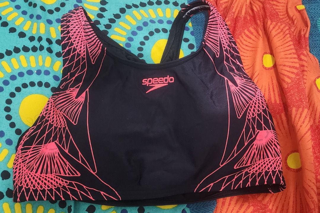 Speedo Endurance+ Black Pink Swimsuit Set (Category: Bikinis & Swimsuits) located in Manila. Submitted by 09mk8967 (Listing ID 1452378639, Image 2). Description: - Speedo swimsuit set - Color: Black with pink geometric pattern - Top: Racerback style with built-in padding - Bottoms: Matching black boy shorts with pink trim - Fabric: Endurance+ for durability - Ideal for: Swimming laps or training.