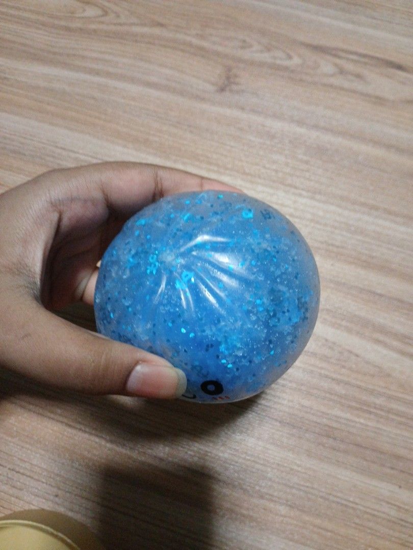 Squishy dumpling (Category: Interactive Toys) located in Singapore. Submitted by raz6714 (Listing ID 1452417121, Image 4). Description: Viral squishy Glitter blue dumpling.