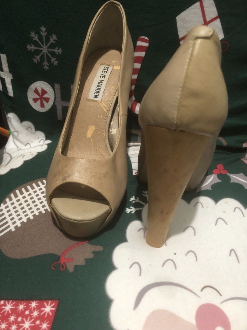 Steve Madden Peep-Toe Platform Heels (Category: Heels) located in Quezon City. Submitted by unique2shop (Listing ID 1452448816, Image 3). Description: - Brand: Steve Madden - Style: Peep-toe heels - Color: Beige/Tan - Features: Platform sole, chunky heel - Condition: Visible scuffs/marks on insoles and exterior. Soles show wear. - Notes: Still has plenty of life left for wear..