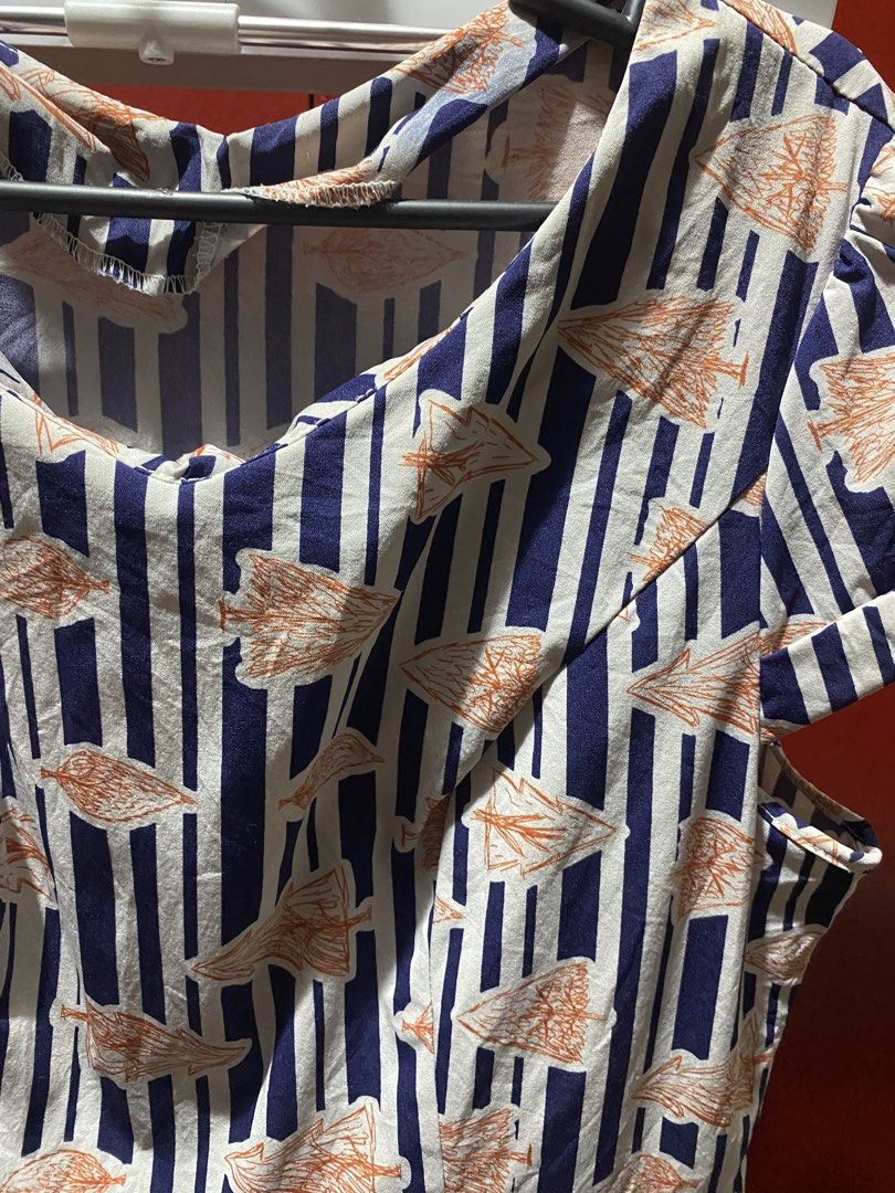Striped Dress with Orange Leaf Pattern (Category: Dresses) located in Bauang. Submitted by nrrandomthings (Listing ID 1452471615, Image 2). Description: - Cute short-sleeved dress - Navy and white stripe pattern with orange leaf print - Pleated skirt for a nice flare - Ideal for casual outings or park days - Comfortable and easy to wear.