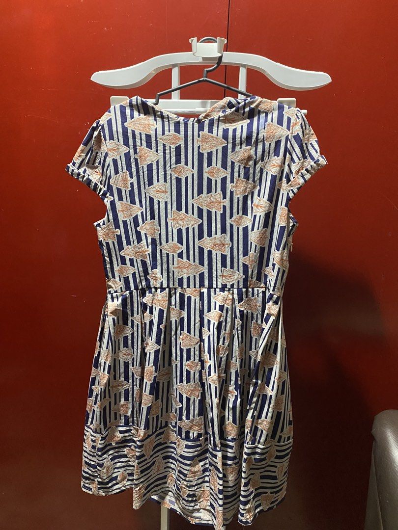 Striped Dress with Orange Leaf Pattern (Category: Dresses) located in Bauang. Submitted by nrrandomthings (Listing ID 1452471615, Image 1). Description: - Cute short-sleeved dress - Navy and white stripe pattern with orange leaf print - Pleated skirt for a nice flare - Ideal for casual outings or park days - Comfortable and easy to wear.