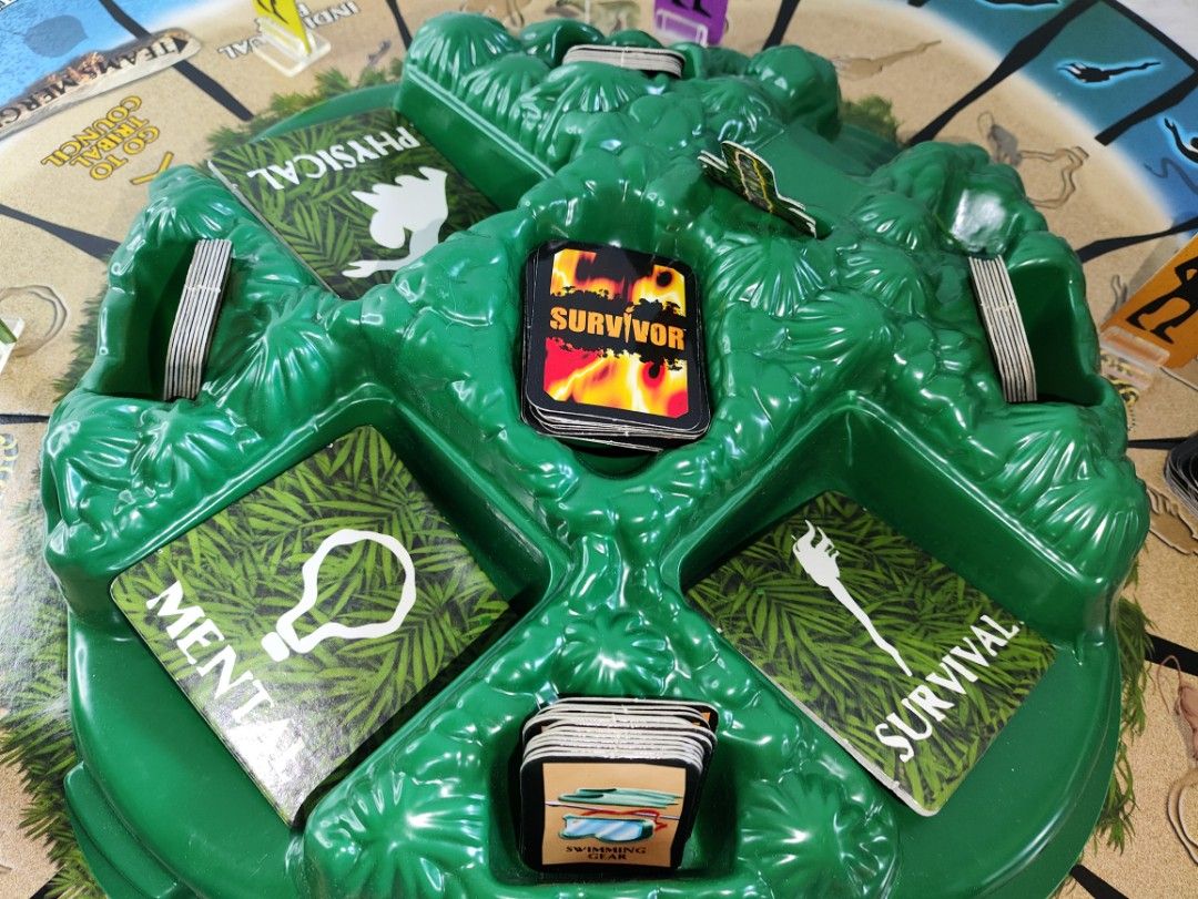 Survivor Trust No One Board Game (Category: Board Games & Puzzles) located in Cavite. Submitted by tinetaclesss (Listing ID 1452476115, Image 3). Description: - Classic Survivor board game: 'Trust No One' - Includes: game board, playing pieces, dice, and cards - Compete in mental, physical, and survival challenges - Great for game nights.