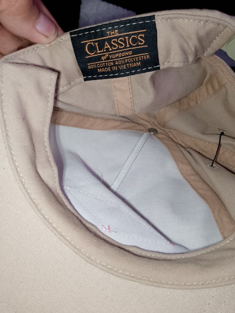 The Classics Yupoong Jack's Surfboards Cap (Category: Caps & Hats) located in General Trias. Submitted by elmerafelix-42143 (Listing ID 1452326418, Image 2). Description: - Tan cap with embroidered Jack's Surfboards logo - Brand: The Classics Yupoong - Material: 60% Cotton, 40% Polyester - Closure: Adjustable snapback - Origin: Made in Vietnam - Style: Great for casual wear.