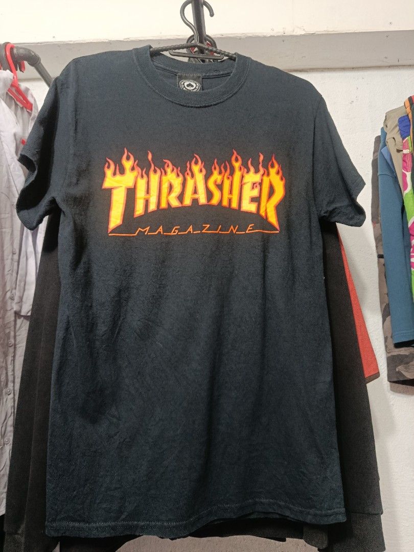 Thrasher Magazine Flame Logo T-Shirt (Category: Tshirts & Polo Shirts ) located in Manila. Submitted by _lemornosnas02 (Listing ID 1452403669, Image 1). Description: - Classic black Thrasher Magazine t-shirt - Features the iconic flame logo graphic - Size: Small (S) - Ideal for skaters and streetwear fans - Simple and cool design.