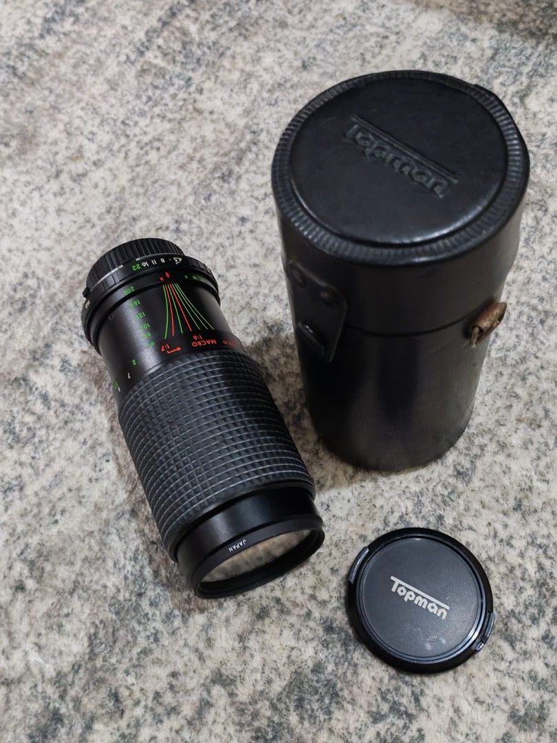 Topman Macro Zoom Lens with Case (Category: Lens & Kits) located in Binan City. Submitted by jenkinabad (Listing ID 1452343642, Image 1). Description: Vintage lens For sale Biñan laguna Lalamove Lbc Meetup up Near biñan Topman 75-200mm zoom lens - Macro function included - Made in Japan - Comes with original Topman leather case and lens cap - Smooth zoom and focus rings - Minor signs of use on exterior.