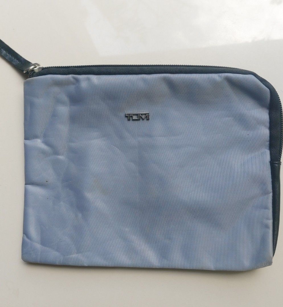 Tumi for Delta Pouch (Category: Luxury Bags & Wallets) located in Lapu Lapu. Submitted by agnesapm_29813 (Listing ID 1452459352, Image 1). Description: - Gray Tumi pouch with Delta collaboration - Ideal for travel or organizing everyday essentials - Features a secure zipper closure - Keeps small items neatly together - Measurements: width-8 inches, height-6.5 inches .