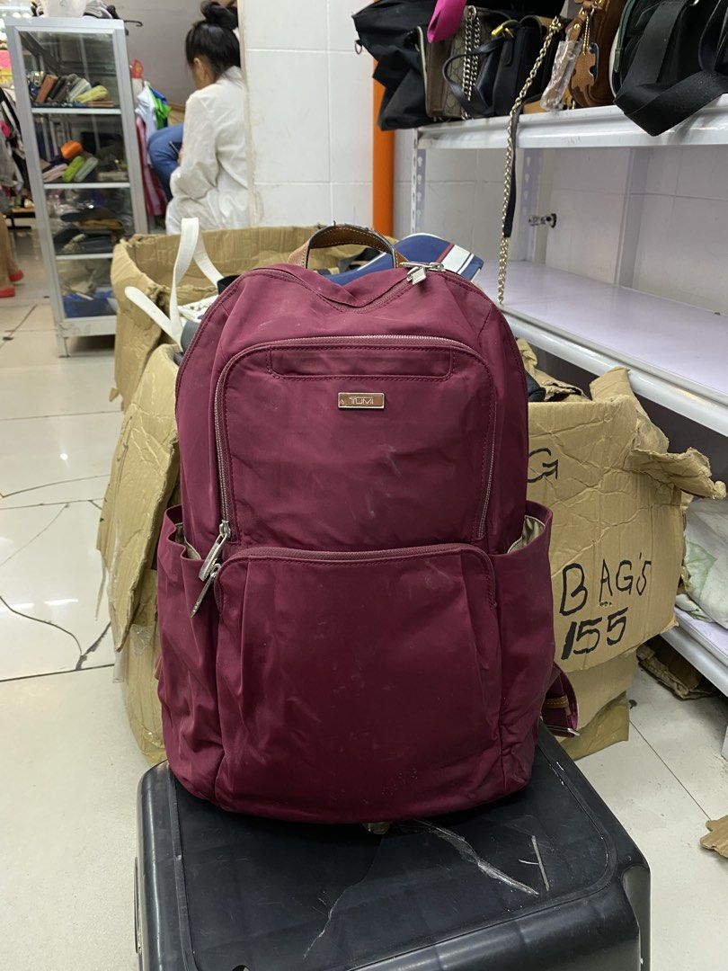 Tumi Nylon Backpack (Category: Luxury Bags & Wallets) located in Legazpi City. Submitted by folksfave (Listing ID 1452495152, Image 1). Description: Excellent condition Working zippers 9/10 color rate Clean inner Hardwares are good No holes No scratches .