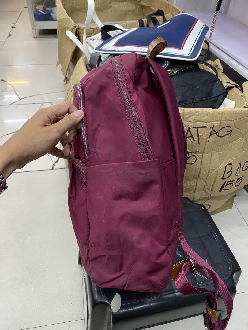 Tumi Nylon Backpack (Category: Luxury Bags & Wallets) located in Legazpi City. Submitted by folksfave (Listing ID 1452495152, Image 3). Description: Excellent condition Working zippers 9/10 color rate Clean inner Hardwares are good No holes No scratches .