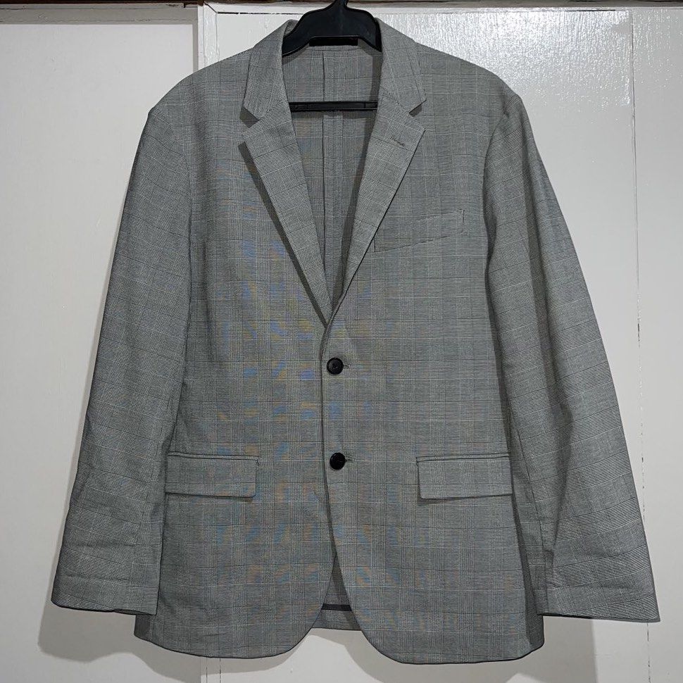 Uniqlo Grey Plaid Slim Fit Blazer (Category: Coats, Jackets and Outerwear) located in Makati City. Submitted by b5closet (Listing ID 1452445103, Image 1). Description: - Uniqlo Grey Plaid Blazer - Size: Fits M-L - Length: 28 inches - Width: 19 inches - Slim Fit Cut - Two-Button Closure - Two Front Pockets - Ideal for Smart Casual or Office Wear NOTE: - Minimal usage ‼️ - Condition: Excellent ‼️ - GCASH and BDO MOP - SF will be shouldered by buyer