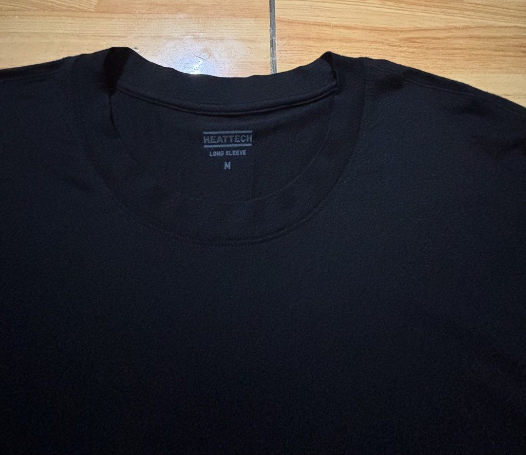 Uniqlo men's heattech inner longsleeves (Category: Activewear) located in Binan City. Submitted by rdgerevilla (Listing ID 1452322996, Image 3). Description: Uniqlo men's heattech inner longsleeves ₱350 Medium on tag Lightly used No issue Color: black Location: Binan .