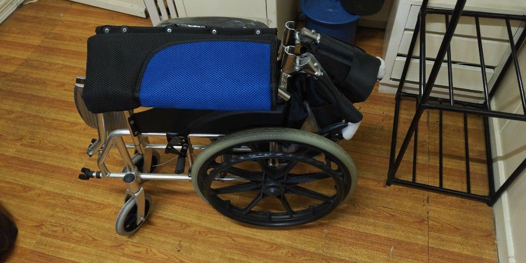 Wheelchair upto 220lbs (Category: Wheelchairs) located in Quezon City. Submitted by thrift.and.find (Listing ID 1452328123, Image 3). Description: This blue and black folding travel wheelchair is a Rios TBW model with big wheels.Foldable Design: The chair features a foldable frame for convenient travel and storage.Material: It is constructed with an aluminum frame, designed to be lightweight.Capacity: This mobility aid is rated for adults and can