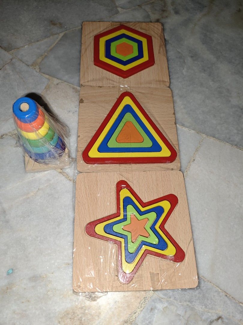 Wooden Shape Sorter & Stacking Toy Set combo 4set (Category: Toys & Games) located in Kajang. Submitted by silverfox_2f013b (Listing ID 1452357996, Image 1). Description: - Fun wooden toy set for little ones. - Includes shape sorter with hexagon, triangle, and star shapes. - Also includes a colorful stacking ring toy. - Great for developing fine motor skills and shape recognition. - Made of brightly colored wood. - Some pieces are still in origin