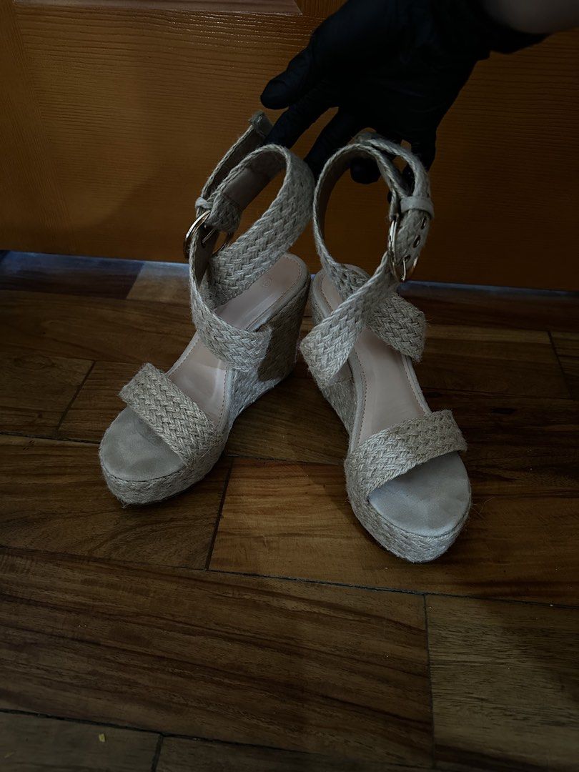 Woven Espadrille Wedge Sandals with Ankle Strap (Category: Wedges) located in Quezon City. Submitted by luxenstuff (Listing ID 1452365379, Image 2). Description: - Cute espadrille wedges - Woven design - Adjustable ankle strap with buckle closure - Platform and wedge heel for added height - Natural beige/tan color - Ideal for summer outfits.