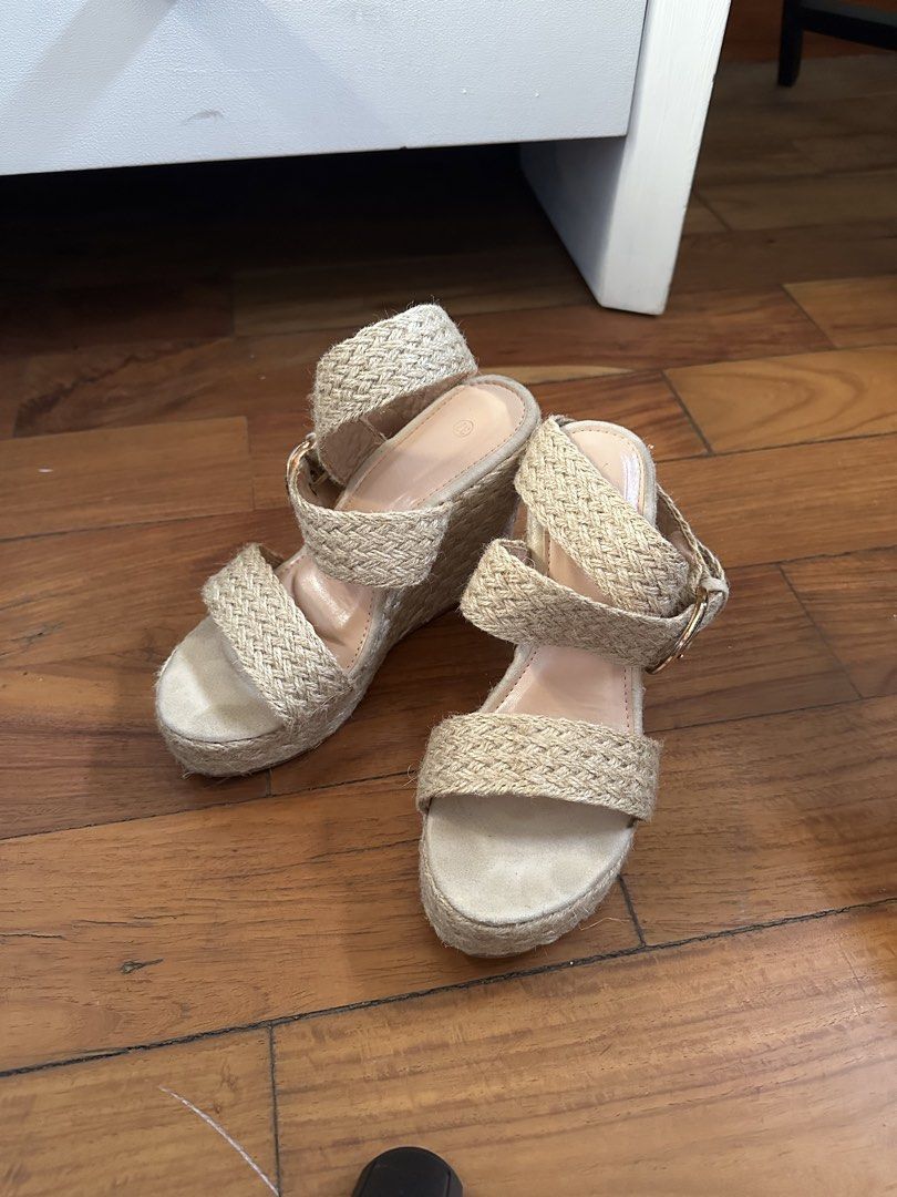 Woven Espadrille Wedge Sandals with Ankle Strap (Category: Wedges) located in Quezon City. Submitted by luxenstuff (Listing ID 1452365379, Image 3). Description: - Cute espadrille wedges - Woven design - Adjustable ankle strap with buckle closure - Platform and wedge heel for added height - Natural beige/tan color - Ideal for summer outfits.
