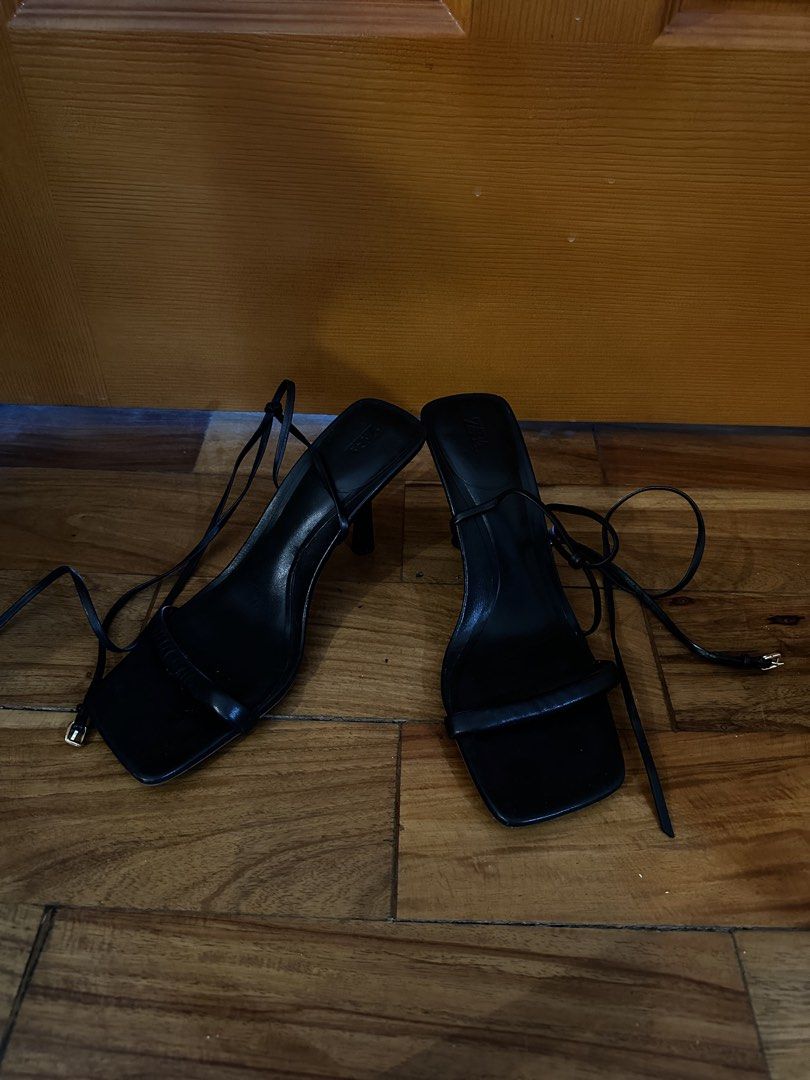 ZARA Black Square Toe Lace-Up Heels Size 39 (Category: Heels) located in Quezon City. Submitted by luxenstuff (Listing ID 1452364996, Image 2). Description: - ZARA black strappy heels - Size 39 - Chic square toe design - Delicate ankle ties - Moderate heel height - Versatile for any outfit.