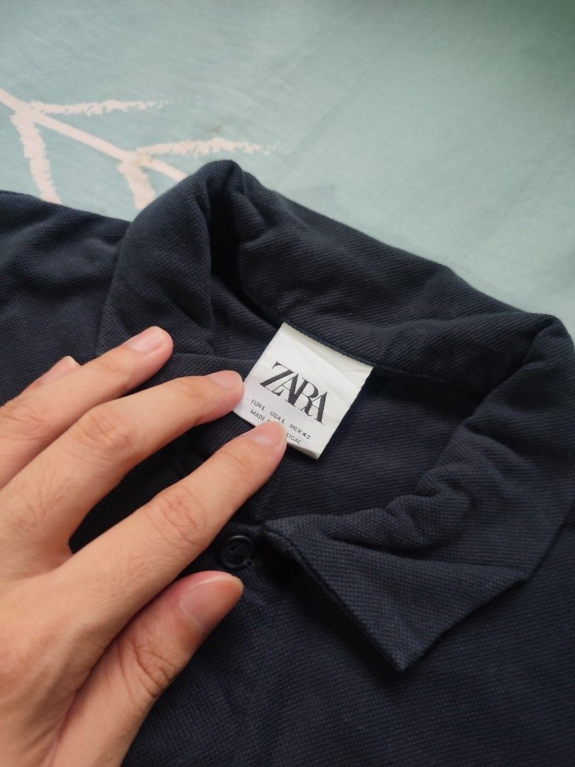 ZARA Navy Blue Polo Shirt (Category: Tshirts & Polo Shirts ) located in General Trias. Submitted by dunht (Listing ID 1452406006, Image 3). Description: Zara W-21 L-29 Color Rate: 9/10.
