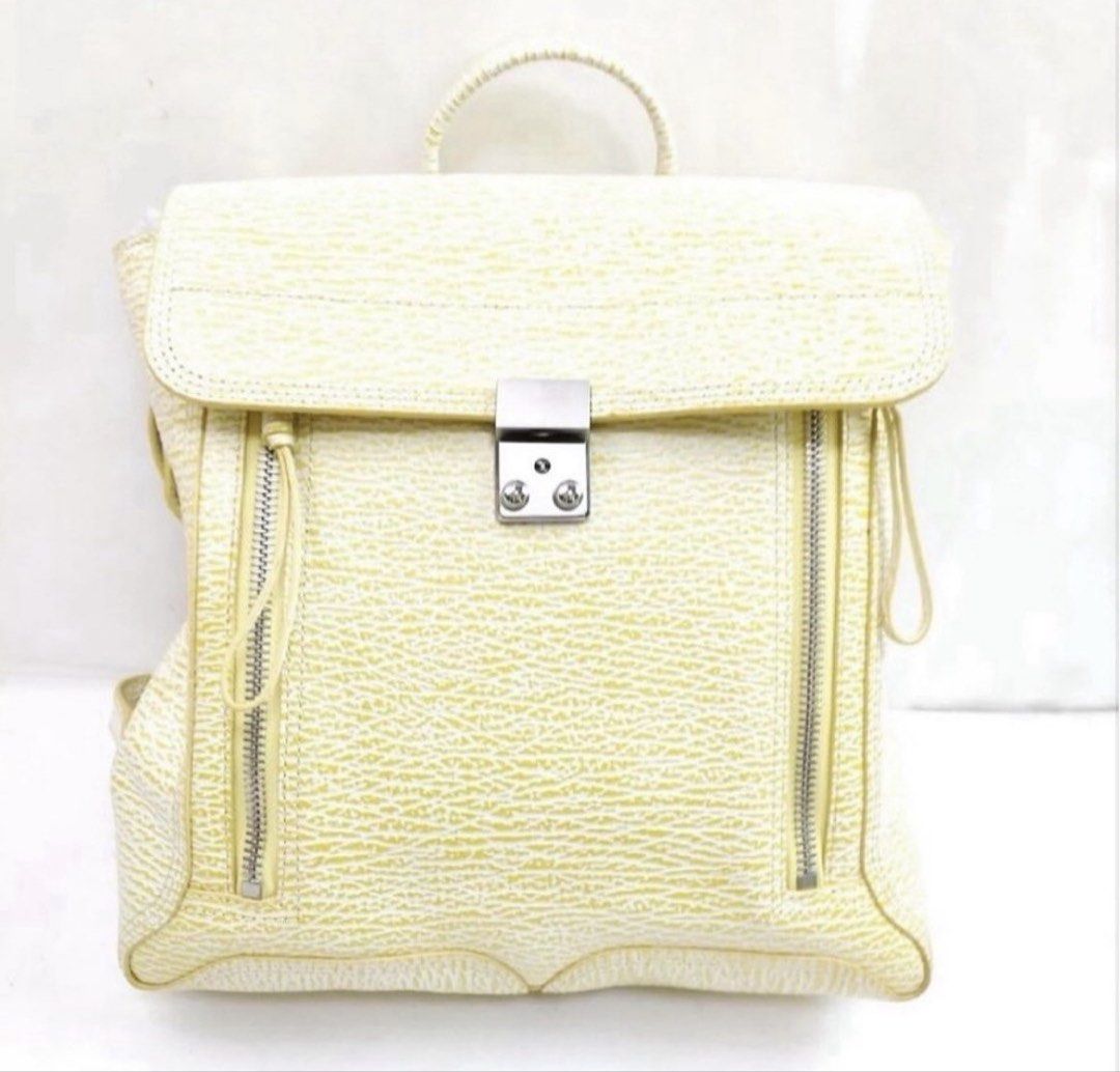 3.1 PHILIP LIM LARGE PASHLI JADE LEATHER BACKPACK-YELLOW (Category: Luxury Bags & Wallets) located in Quezon City. Submitted by carsenmktg (Listing ID 1452529519, Image 2). Description: 3.1 PHILIP LIM LARGE PASHLI JADE LEATHER BACKPACK-YELLOW guaranteed authentic. used a few times in very good condtion. minor signs of use. no stains or holes. bought in the u.s. for about $450. Width (inch) : 13.7 inch(approx) Width (cm) : 35 cm(approx) Height (in